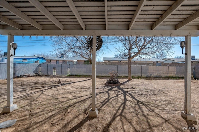 view of yard featuring a patio area and fence