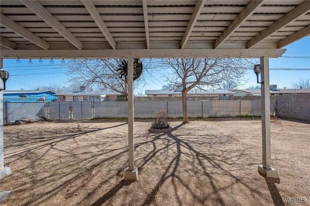 view of yard with fence and a patio