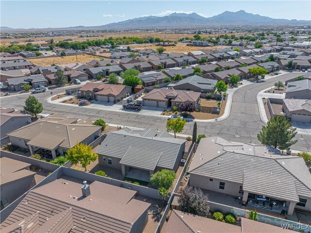 bird's eye view with a residential view and a mountain view