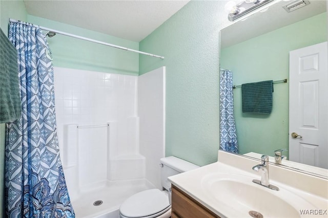 4403 S Via Rialto Ln, Fort Mohave, AZ 86426 - bathroom featuring visible vents, vanity, a textured wall, toilet, and a shower with curtain