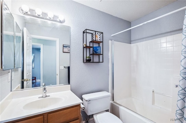 4403 S Via Rialto Ln, Fort Mohave, AZ 86426 - bathroom with toilet, a textured wall, shower / bath combo, and vanity