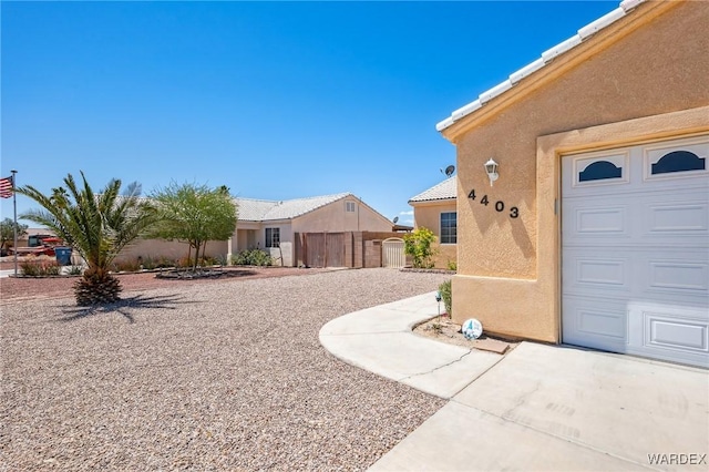 4403 S Via Rialto Ln, Fort Mohave, AZ 86426 - entrance to property with a gate, stucco siding, and fence