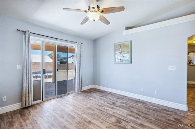 4403 S Via Rialto Ln, Fort Mohave, AZ 86426 - unfurnished room with ceiling fan, vaulted ceiling, and wood finished floors