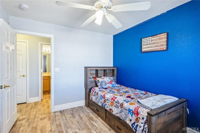 4403 S Via Rialto Ln, Fort Mohave, AZ 86426 - bedroom featuring a ceiling fan, baseboards, and wood finished floors