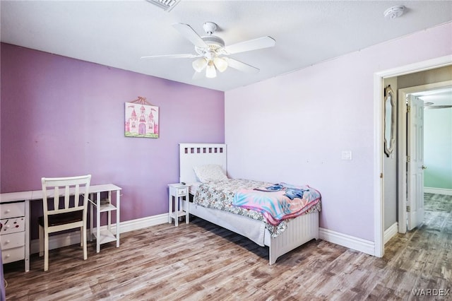 4403 S Via Rialto Ln, Fort Mohave, AZ 86426 - bedroom with baseboards, ceiling fan, and wood finished floors