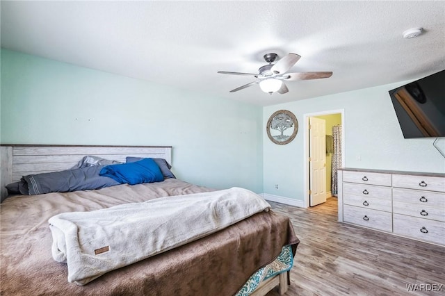 4403 S Via Rialto Ln, Fort Mohave, AZ 86426 - bedroom with baseboards, ceiling fan, and wood finished floors