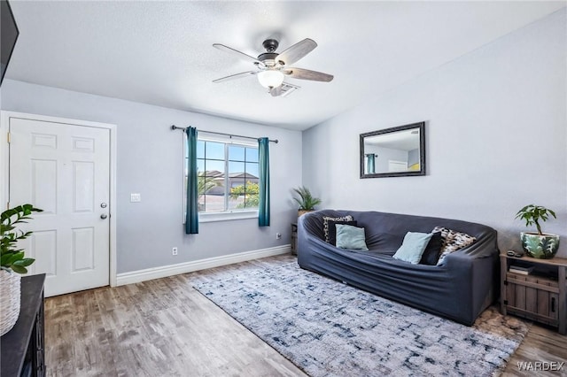 4403 S Via Rialto Ln, Fort Mohave, AZ 86426 - living room featuring baseboards, ceiling fan, and wood finished floors
