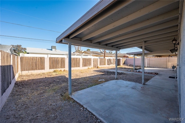 view of patio with a fenced backyard