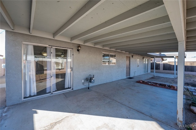 view of patio featuring fence