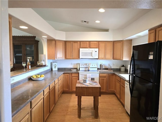 kitchen with recessed lighting, visible vents, white appliances, and light wood-style floors