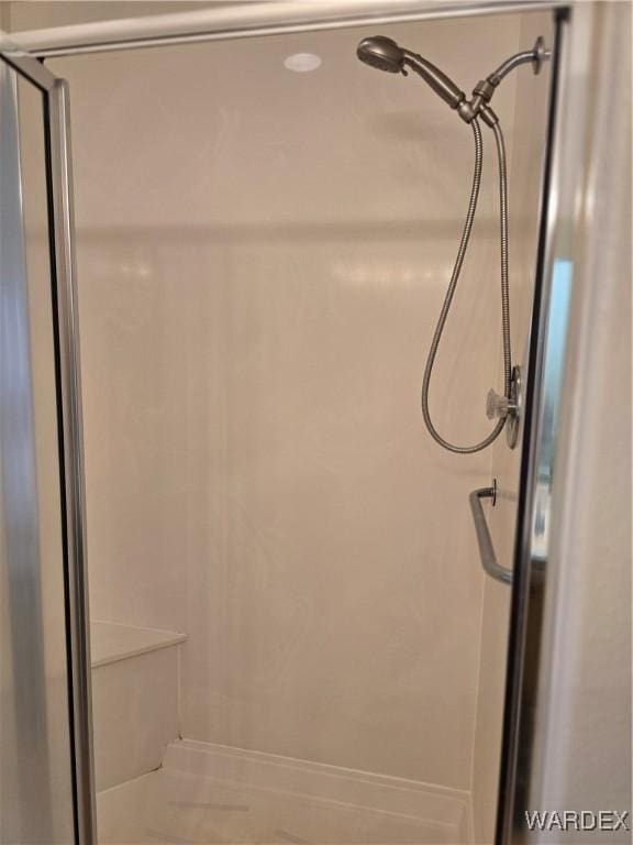 full bathroom with a stall shower