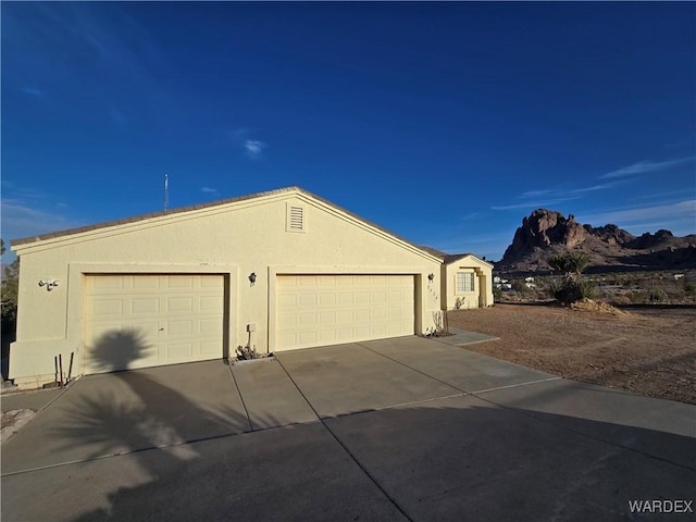 garage with driveway