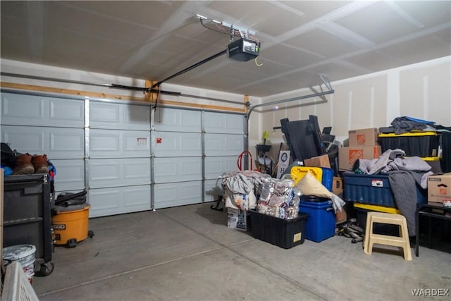 garage featuring a garage door opener