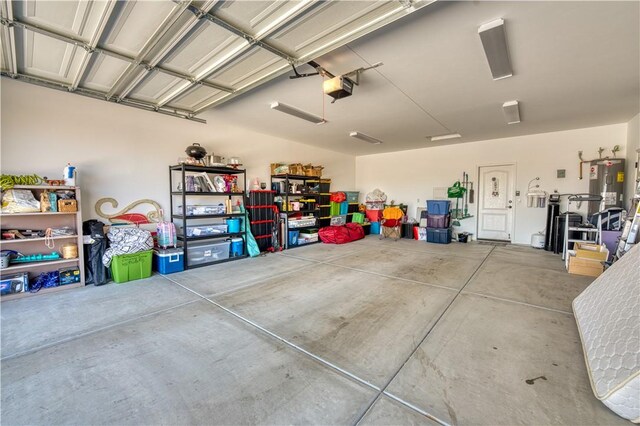 3492 Tres Alamos Dr, Bullhead City, AZ 86442 - garage with a garage door opener and electric water heater