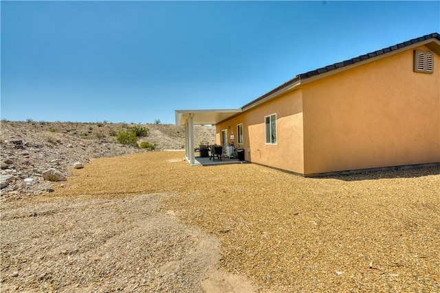 3492 Tres Alamos Dr, Bullhead City, AZ 86442 - view of yard featuring a patio