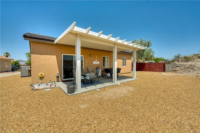 3492 Tres Alamos Dr, Bullhead City, AZ 86442 - rear view of house featuring stucco siding and a patio