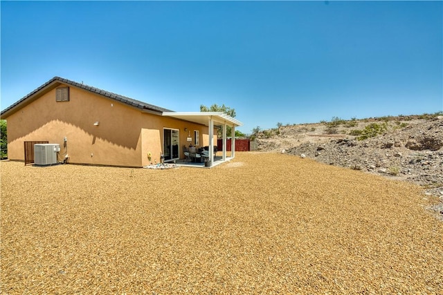3492 Tres Alamos Dr, Bullhead City, AZ 86442 - back of property featuring stucco siding and a patio area