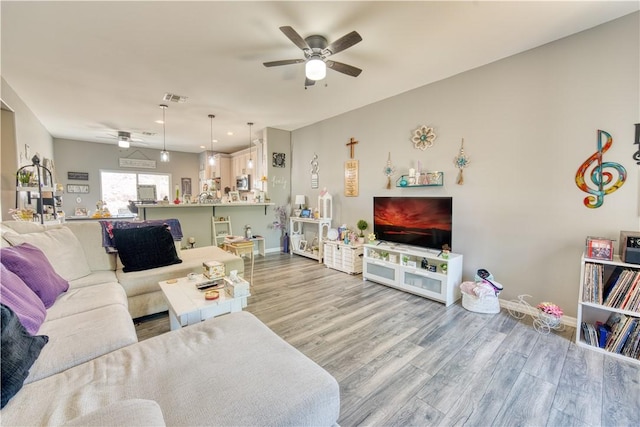 3492 Tres Alamos Dr, Bullhead City, AZ 86442 - living room featuring ceiling fan and wood finished floors
