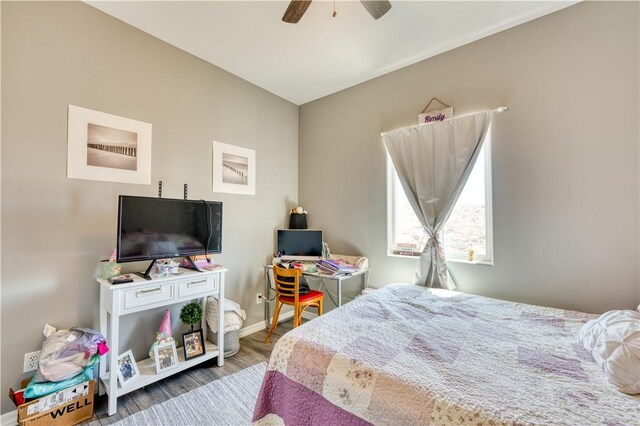 3492 Tres Alamos Dr, Bullhead City, AZ 86442 - bedroom with wood finished floors and ceiling fan
