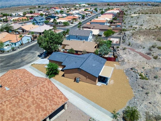 3492 Tres Alamos Dr, Bullhead City, AZ 86442 - aerial perspective of suburban area with a mountain backdrop