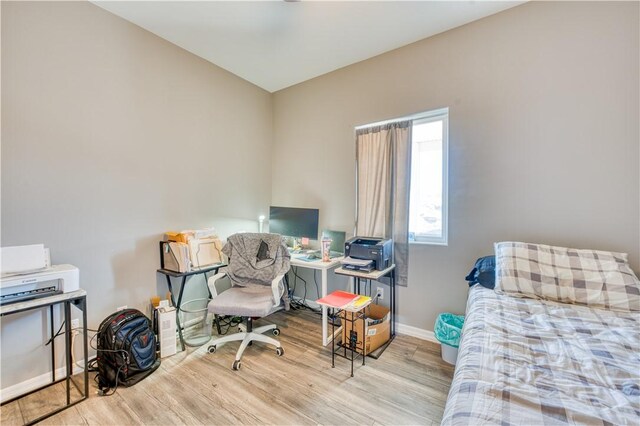 3492 Tres Alamos Dr, Bullhead City, AZ 86442 - bedroom featuring wood finished floors and an office area