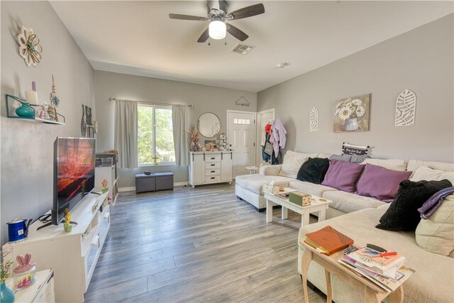 3492 Tres Alamos Dr, Bullhead City, AZ 86442 - living area featuring a ceiling fan and light wood-type flooring