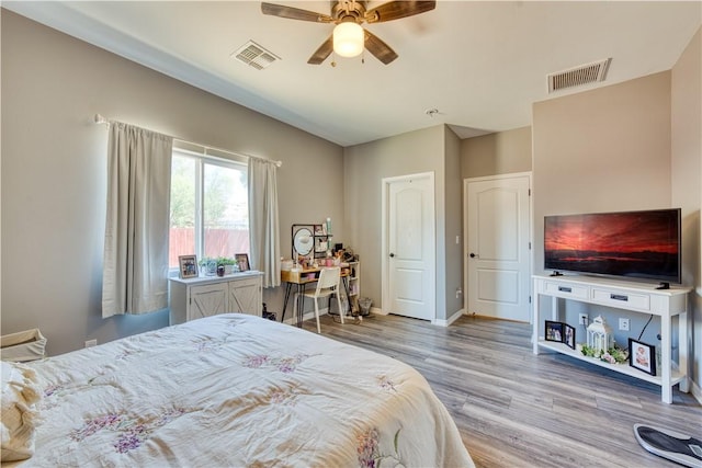 3492 Tres Alamos Dr, Bullhead City, AZ 86442 - bedroom featuring wood finished floors and ceiling fan