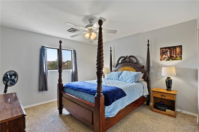 bedroom with baseboards, ceiling fan, visible vents, and light colored carpet