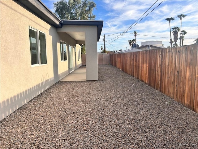 view of yard featuring a patio and a fenced backyard