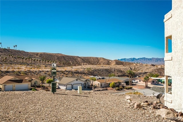 property view of mountains with a residential view