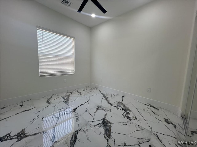 spare room featuring baseboards, recessed lighting, visible vents, and a ceiling fan