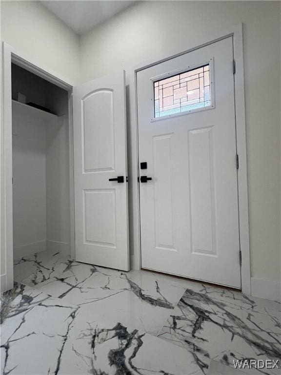 foyer with marble finish floor