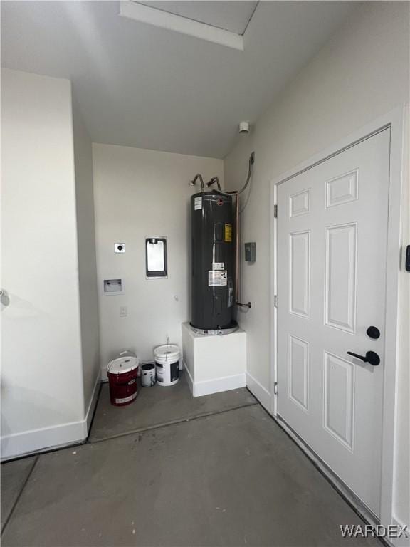 utility room featuring electric water heater