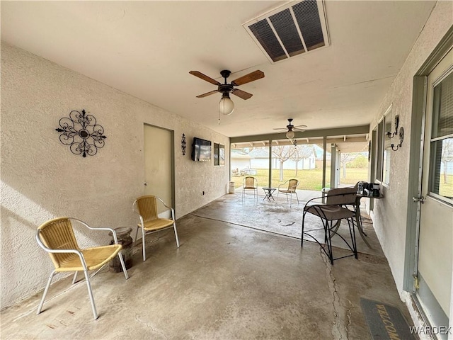 view of patio / terrace with visible vents and ceiling fan