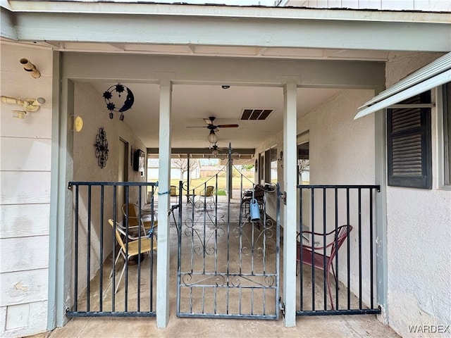 exterior space with visible vents and ceiling fan