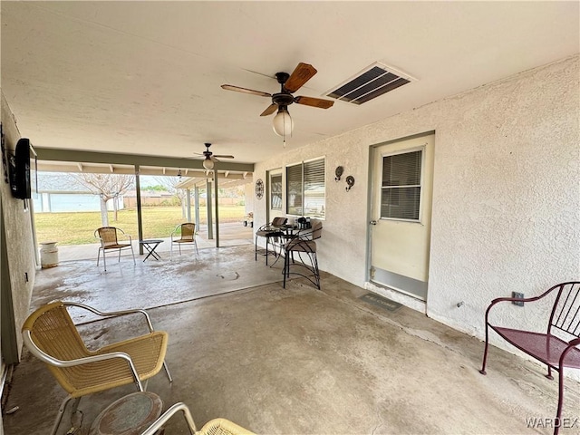 view of patio / terrace with visible vents and ceiling fan