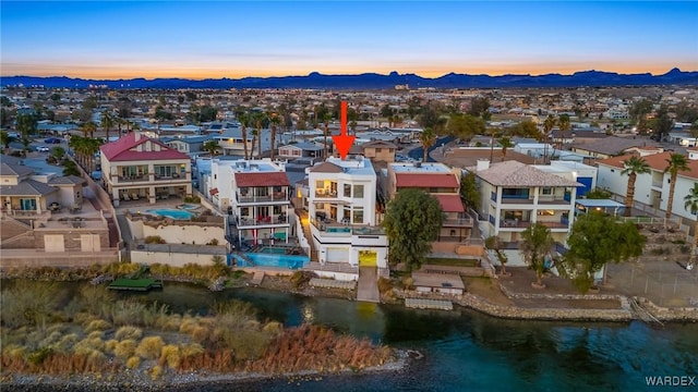 bird's eye view with a mountain view and a residential view