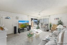 living room featuring brick wall