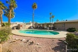 view of pool featuring a fenced in pool, a patio, and fence