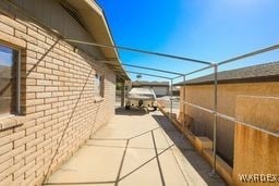 view of side of property with brick siding