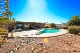 pool with a patio area