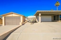 view of front of property with a garage and driveway