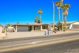 view of front of home with driveway and an attached garage