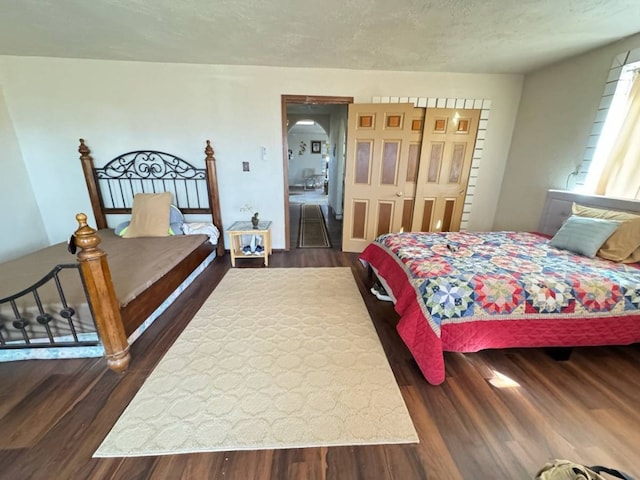 18000 Laurel Rd, Dolan Springs, AZ 86441 - bedroom with dark wood-style floors and a closet