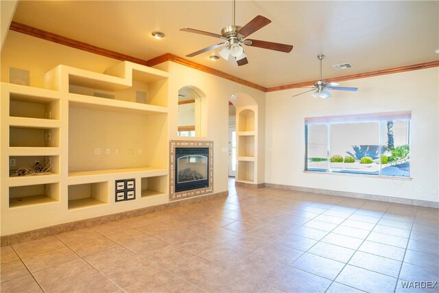 unfurnished living room with built in features, visible vents, baseboards, and light tile patterned flooring