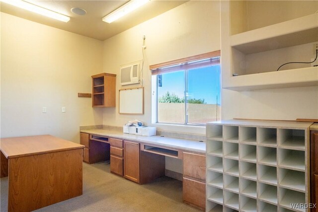 home office featuring light carpet and a wall mounted AC