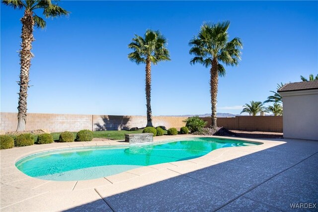 view of pool with a fenced in pool, a patio area, and a fenced backyard