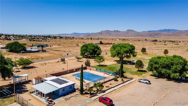 bird's eye view with a mountain view, a rural view, and a desert view