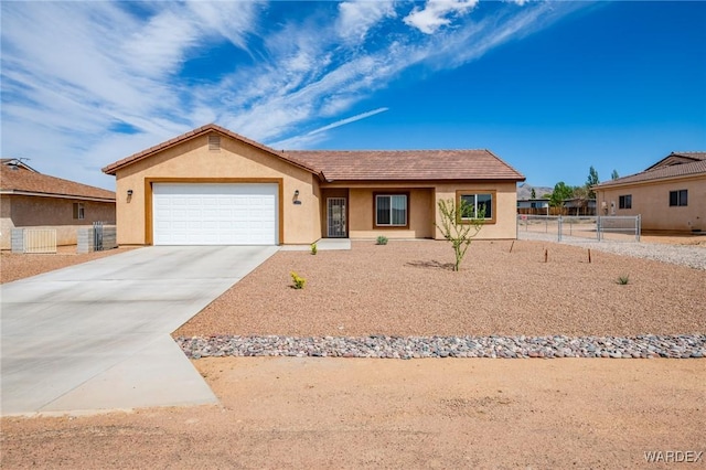 ranch-style house with stucco siding, driveway, a tiled roof, an attached garage, and fence