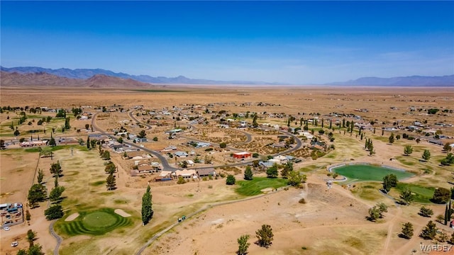 birds eye view of property with a mountain view and a residential view